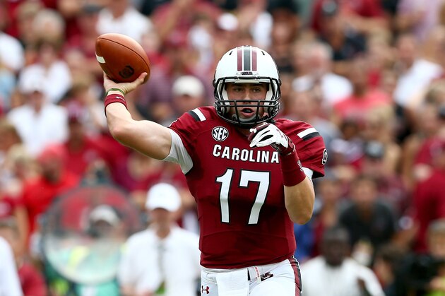 COLUMBIA, SC - SEPTEMBER 13:  Dylan Thompson #17 of the South Carolina Gamecocks throws a pass against the Georgia Bulldogs during their game at Williams-Brice Stadium on September 13, 2014 in Columbia, South Carolina.  (Photo by Streeter Lecka/Getty Images)