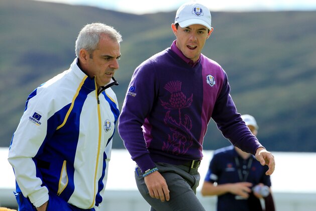 AUCHTERARDER, SCOTLAND - SEPTEMBER 24:  Rory McIlroy (R) of Europe talks with Europe team captain Paul McGinley during practice ahead of the 2014 Ryder Cup on the PGA Centenary course at the Gleneagles Hotel on September 24, 2014 in Auchterarder, Scotland.  (Photo by David Cannon/Getty Images)