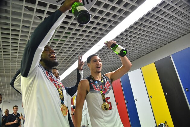 MADRID, SPAIN - SEPTEMBER 14: Kenneth Faried #7 and Klay Thompson #5 of the USA Men's National Team celebrates in the locker room after defeating the Serbia National Team during the 2014 FIBA World Cup Finals at Palacio de Deportes on September 14, 2014 in Madrid, Spain.  NOTE TO USER: User expressly acknowledges and agrees that, by downloading and/or using this Photograph, user is consenting to the terms and conditions of the Getty Images License Agreement. Mandatory Copyright Notice: Copyright 2014 NBAE (Photo by Jesse D. Garrabrant/NBAE via Getty Images)