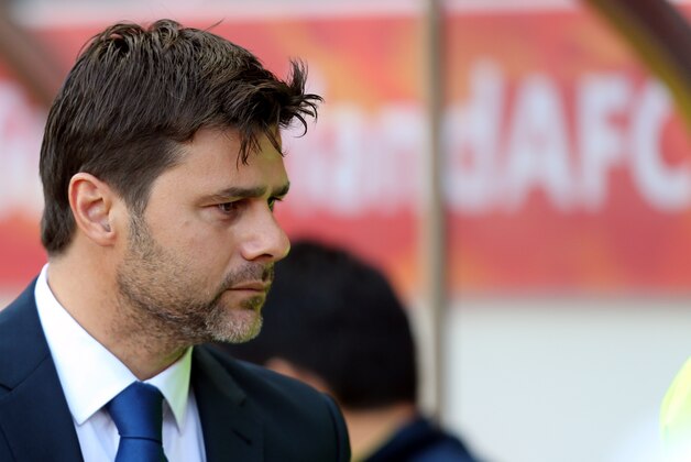 Tottenham Hotspurs' manager Mauricio Pochettino looks on ahead of their English Premier League soccer match against Sunderland at the Stadium of Light, Sunderland, England, Saturday, Sept. 13, 2014. (AP Photo/Scott Heppell)