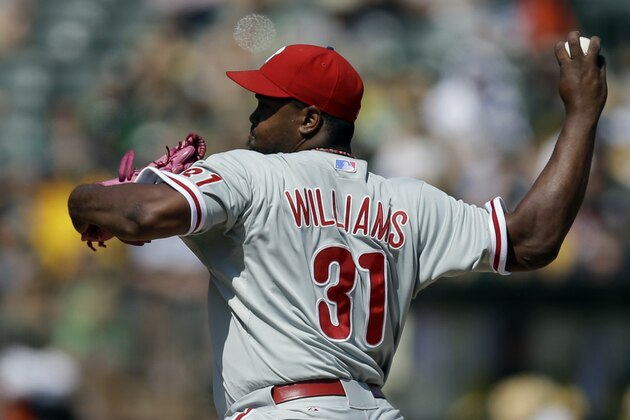 Philadelphia Phillies' Jerome Williams delivers against the Oakland Athletics in the first inning of a baseball game Saturday, Sept. 20, 2014, in Oakland, Calif. (AP Photo/Ben Margot)