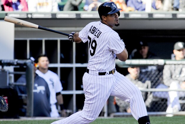 Chicago White Sox's Jose Abreu doubles during the third inning of the first game of a baseball doubleheader against the Minnesota Twins in Chicago on Saturday, Sept. 13, 2014. (AP Photo/Matt Marton)
