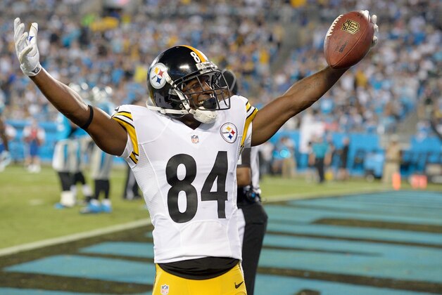 CHARLOTTE, NC - SEPTEMBER 21: Antonio Brown #84 of the Pittsburgh Steelers celebrates after scoring a touchdown against the Carolina Panthers during their game at Bank of America Stadium on September 21, 2014 in Charlotte, North Carolina. (Photo by Grant Halverson/Getty Images)
