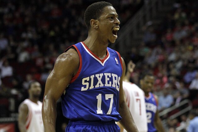 Philadelphia 76ers' Casper Ware (17) reacts after making a 3-point basket against the Houston Rockets during the first half of an NBA basketball game on Thursday, March 27, 2014, in Houston. (AP Photo/Bob Levey)