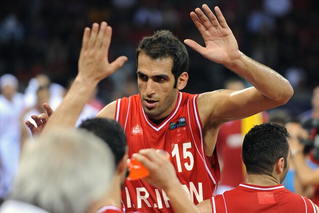 ISTANBUL, TURKEY - AUGUST 30: Hamed Haddadi #15 of Iran celebrates after the game against Tunisia during the 2010 World Championships of Basketball on August 30, 2010 at Abdi Ipekci Arena in Istanbul, Turkey. NOTE TO USER: User expressly acknowledges and agrees that, by downloading and/or using this Photograph, user is consenting to the terms and conditions of the Getty Images License Agreement. Mandatory Copyright Notice: Copyright 2010 NBAE (Photo by Garrett W. Ellwood/NBAE via Getty Images)