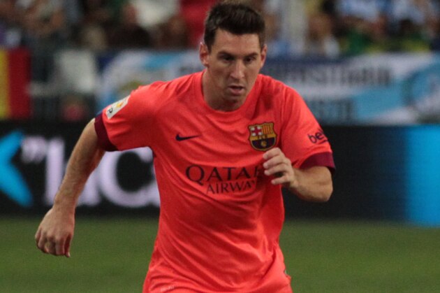 MALAGA, SPAIN - SEPTEMBER 24:  Lionel Messi of F.C. Barcelona controls the ball during the La Liga match between Malaga CF and FC Barcelona at La Rosaleda studium on September 24, 2014 in Malaga, Spain. (Photo by Sergio Camacho/Getty Images)