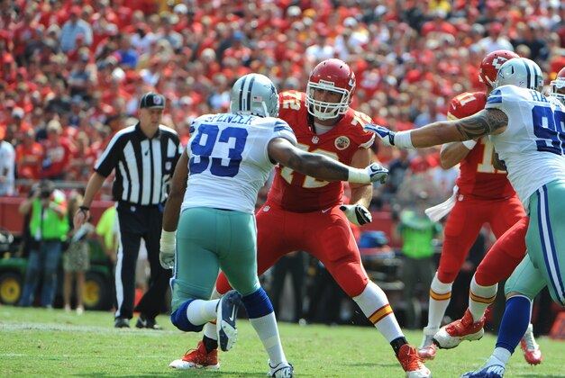 Sep 15, 2013; Kansas City, MO, USA;  Kansas City Chiefs offensive tackle Eric Fisher (72) blocks against Dallas Cowboys defensive end Anthony Spencer (93) in the second half at Arrowhead Stadium. Kansas City won the game 17-16. Mandatory Credit: John Rieger-USA TODAY Sports