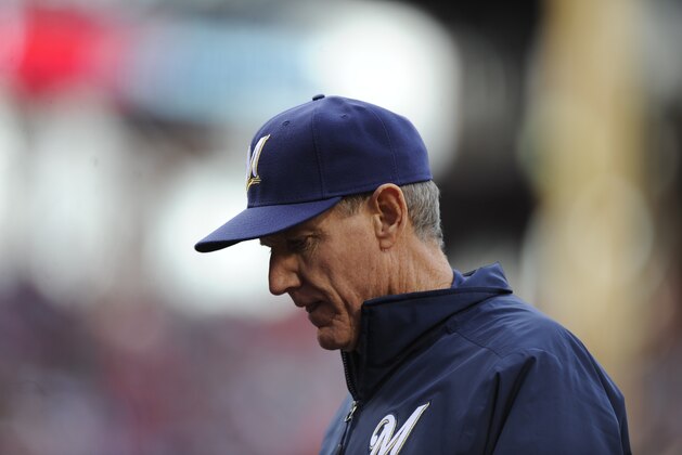 Milwaukee Brewers manager Ron Roenicke is seen during an baseball  game against the Philadelphia Phillies on Tuesday, April 8, 2014, in Philadelphia. The Brewers won 10-4. (AP Photo/Michael Perez)