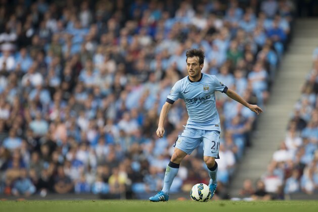 Manchester City's David Silva takes the ball downfield during his team's English Premier League soccer match against Chelsea at the Etihad Stadium, Manchester, England, Sunday Sept. 21, 2014. (AP Photo/Jon Super) Manchester City's David Silva takes the ball downfield during his team's English Premier League soccer match against Chelsea at the Etihad Stadium, Manchester, England, Sunday Sept. 21, 2014. (AP Photo/Jon Super)