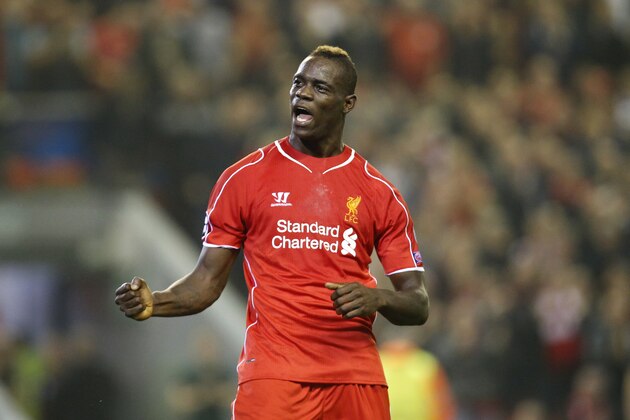 Liverpool's Mario Balotelli celebrates after scoring against Ludogorets during the Champions League Group B soccer match between Liverpool and Ludogorets at Anfield Stadium in Liverpool, England, Tuesday, Sept. 16, 2014. (AP Photo/Jon Super)