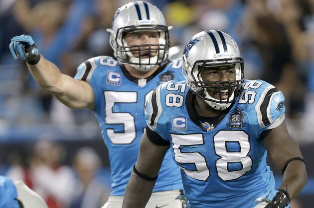 Carolina Panthers' Luke Kuechly (59) and Thomas Davis (58) call the defense against the Pittsburgh Steelers during the second half an NFL football game in Charlotte, N.C., Sunday, Sept. 21, 2014. The Steelers won 37-19. (AP Photo/Bob Leverone)