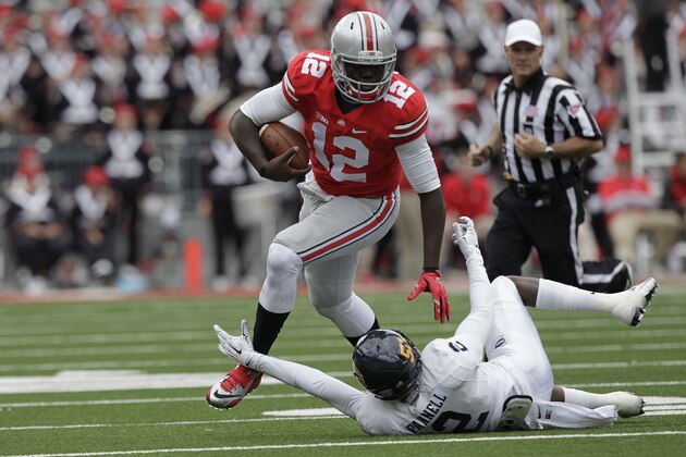 Ohio State quarterback Cardale Jones plays against Kent State during an NCAA college football game Saturday, Sept. 13, 2014, in Columbus, Ohio. (AP Photo/Jay LaPrete) Ohio State quarterback Cardale Jones plays against Kent State during an NCAA college football game Saturday, Sept. 13, 2014, in Columbus, Ohio. (AP Photo/Jay LaPrete)