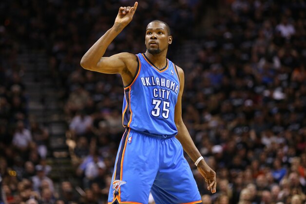 SAN ANTONIO, TX - MAY 19:  Kevin Durant #35 of the Oklahoma City Thunder reacts in the second half while taking on the San Antonio Spurs in Game One of the Western Conference Finals during the 2014 NBA Playoffs at AT&T Center on May 19, 2014 in San Antonio, Texas. NOTE TO USER: User expressly acknowledges and agrees that, by downloading and or using this photograph, User is consenting to the terms and conditions of the Getty Images License Agreement.  (Photo by Ronald Martinez/Getty Images)