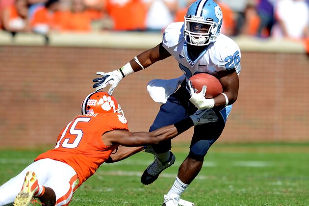 North Carolina running back Giovani Bernard shakes loose from Clemson's  Coty Sensabaugh during an NCAA college football game Saturday, Oct. 22, 2011, at Memorial Stadium in Clemson, S.C.   (AP Photo/ Richard Shiro)