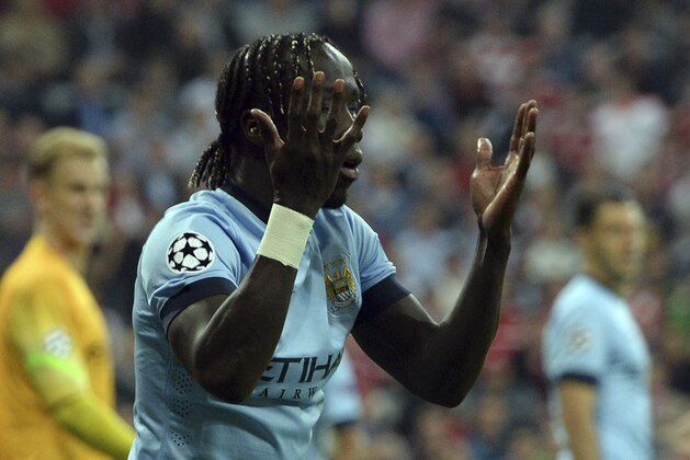Manchester City's Bacary Sagna gestures during the Champions League group E soccer match between Bayern Munich and Manchester City in Munich, Germany, Wednesday Sept.17,2014. (AP Photo/Kerstin Joensson)
