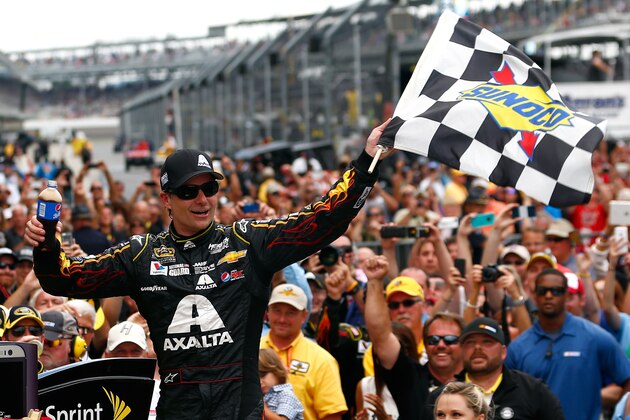 INDIANAPOLIS, IN - JULY 27:  Jeff Gordon, driver of the #24 Axalta Chevrolet, celebrates in Victory Lane after winning the NASCAR Sprint Cup Series Crown Royal Presents The John Wayne Walding 400 at the Brickyard Indianapolis Motor Speedway on July 27, 2014 in Indianapolis, Indiana.  (Photo by Chris Trotman/Getty Images)