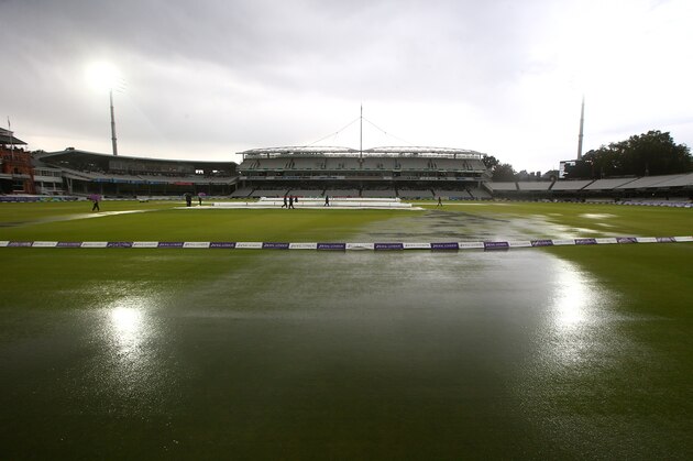 LONDON, ENGLAND - AUGUST 14: The rain covers come on as a heavy storm stops play during the Royal London One-Day Cup match between Middlesex Panthers and Nottinghamshire Outlaws at Lord's Cricket Ground on August 14, 2014 in London, England. (Photo by Charlie Crowhurst/Getty Images)
