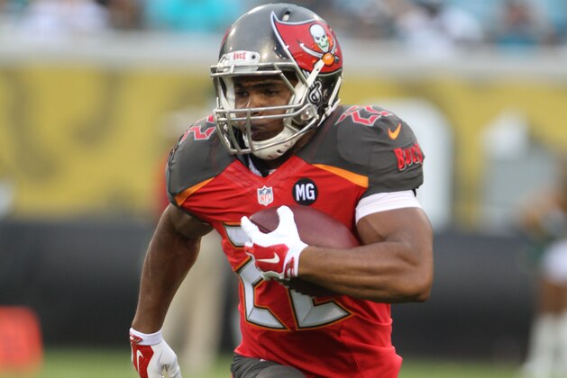 Running back Doug Martin #22 of the Tampa Bay Buccaneers runs the ball during a Pre-Season NFL football game against the Jacksonville Jaguars, Friday, Aug. 8, 2014, in Jacksonville, Fla. (Photo by Marc Serota/Panini/AP Images) Running back Doug Martin #22 of the Tampa Bay Buccaneers runs the ball during a Pre-Season NFL football game against the Jacksonville Jaguars, Friday, Aug. 8, 2014, in Jacksonville, Fla. (Photo by Marc Serota/Panini/AP Images)