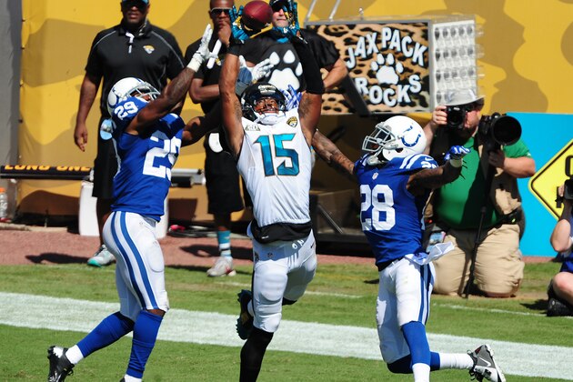 JACKSONVILLE, FL - SEPTEMBER 21: Allen Robinson #15 of the Jacksonville Jaguars goes up for a pass against Greg Toler #28 and Mike Adams #29 of the Indianapolis Colts at EverBank Field on September 21, 2014 in Jacksonville, Florida. (Photo by Scott Cunningham/Getty Images)