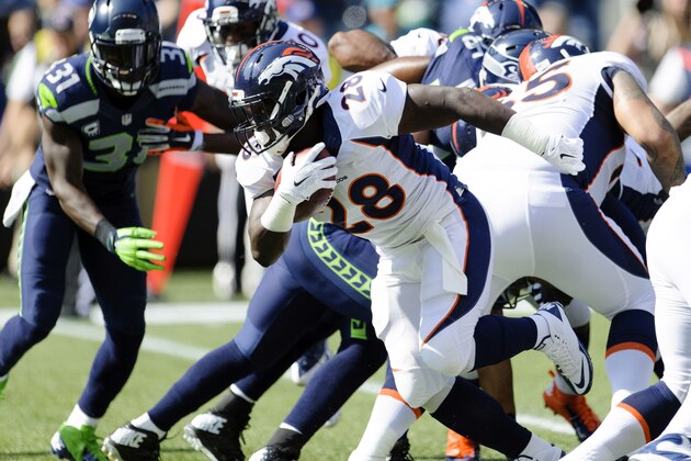 Sep 21, 2014; Seattle, WA, USA; Denver Broncos running back Montee Ball (28) carries the ball against the Seattle Seahawks during the first half at CenturyLink Field. Seattle defeated Denver 26-20. Mandatory Credit: Steven Bisig-USA TODAY Sports