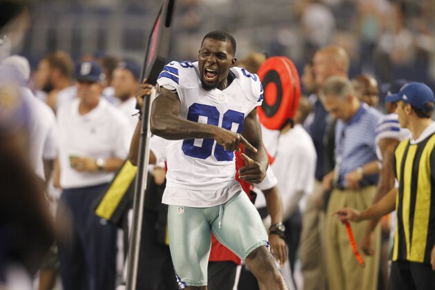 Dallas Cowboys wide receiver Dez Bryant (88) reacts to a play from the sideline during the second half of an NFL preseason football game against the Baltimore Ravens Saturday, Aug. 16, 2014, in Arlington, Texas. (AP Photo/Matt Strasen)