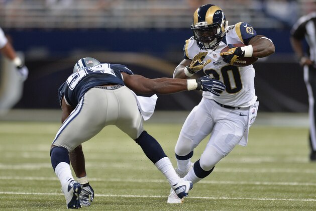 ST. LOUIS, MO - SEPTEMBER 21: Zac Stacy #30 of the St. Louis Rams rushes against the Dallas Cowboys in the first quarter at the Edward Jones Dome on September 21, 2014 in St. Louis, Missouri.  (Photo by Michael B. Thomas/Getty Images)