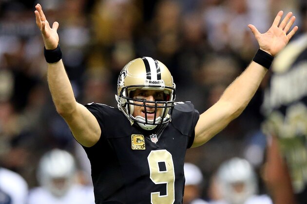 NEW ORLEANS, LA - NOVEMBER 10:  Quarterback Drew Brees #9 of the New Orleans Saints celebrates against the Dallas Cowboys during a game at the Mercedes-Benz Superdome on November 10, 2013 in New Orleans, Louisiana.  (Photo by Ronald Martinez/Getty Images)
