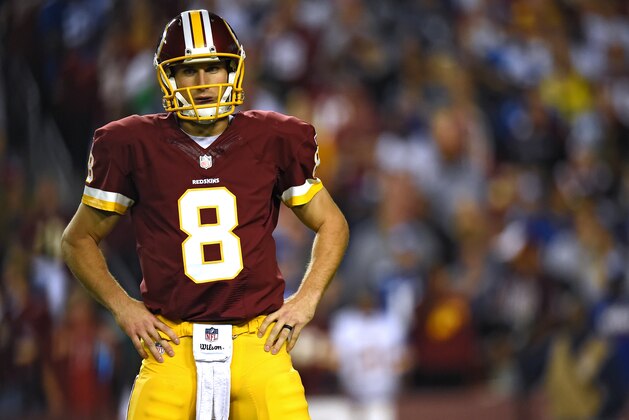 LANDOVER, MD - SEPTEMBER 25: Quarterback Kirk Cousins #8 of the Washington Redskins looks on in the first quarter against the New York Giants at FedExField on September 25, 2014 in Landover, Maryland. (Photo by Patrick Smith/Getty Images)