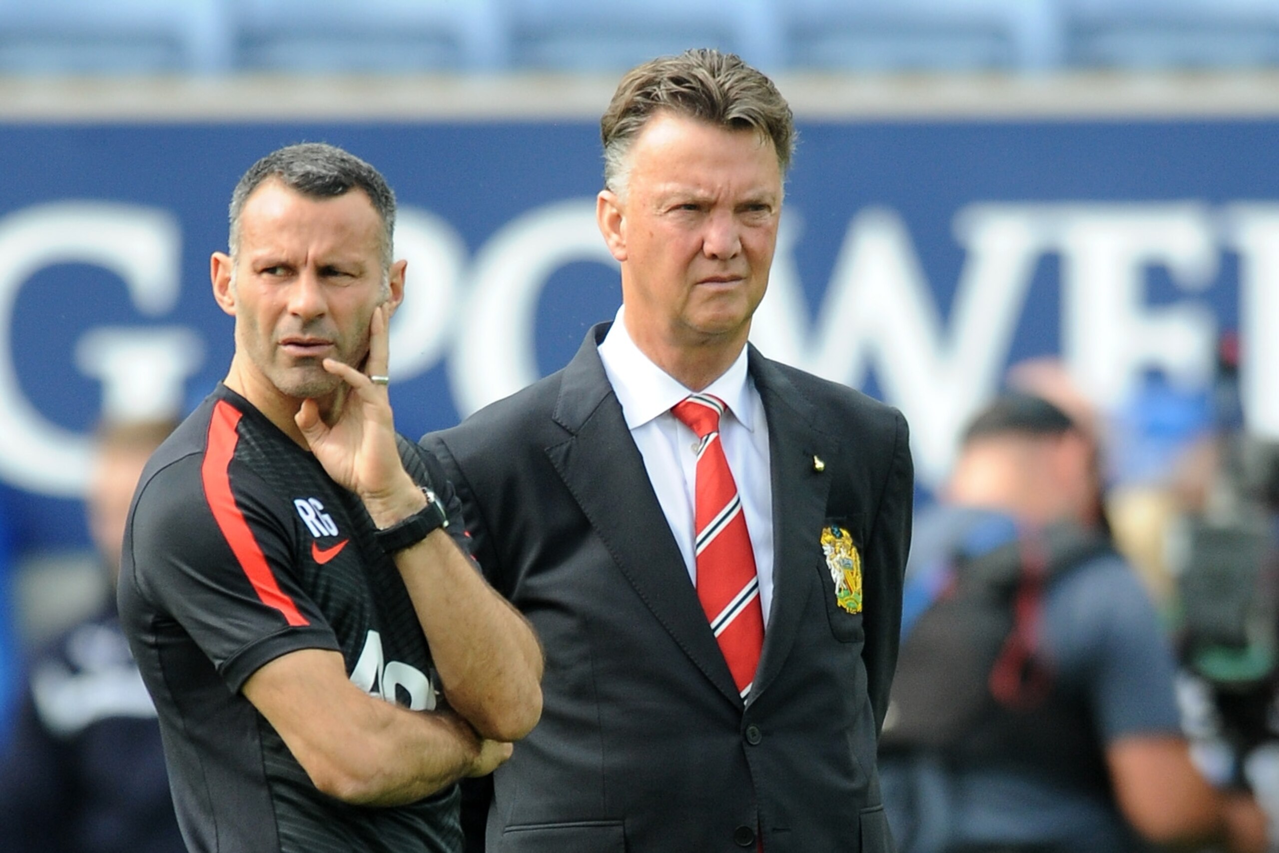 Manchester United manager Louis van Gaal, right, and assistant manager Ryan Giggs before the English Premier League soccer match between Leicester City and Manchester United at King Power Stadium, in Leicester, England, Sunday, Sept. 21, 2014.  (AP Photo/Rui Vieira)