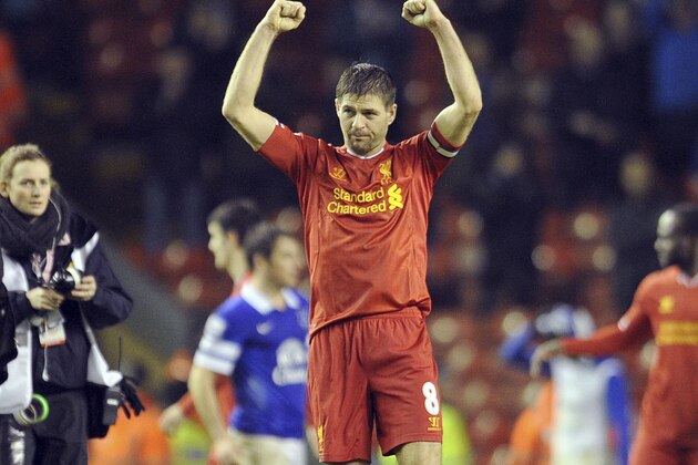 Liverpool's Steven Gerrard celebrates his side's victory at the end of the game during their English Premier League soccer match against Everton at Anfield in Liverpool, England, Tuesday Jan. 28, 2014. (AP Photo/Clint Hughes)