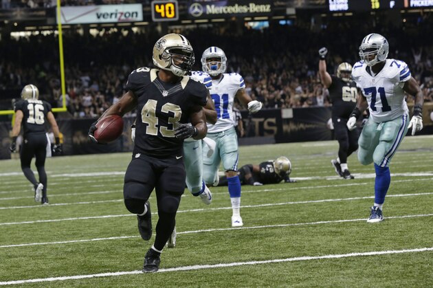 New Orleans Saints running back Darren Sproles (43) carries on a rushing touchdown in the first half of an NFL football game against the Dallas Cowboys in New Orleans, Sunday, Nov. 10, 2013. (AP Photo/Dave Martin)