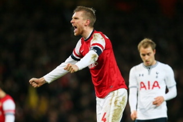 LONDON, ENGLAND - JANUARY 04:  Per Mertesacker of Arsenal celebrates his team's 2-0 victory during the Budweiser FA Cup third round match between Arsenal and Tottenham Hotspur at Emirates Stadium on January 4, 2014 in London, England.  (Photo by Clive Rose/Getty Images)