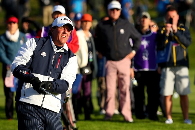 AUCHTERARDER, SCOTLAND - SEPTEMBER 26: Phil Mickelson of the United States hits his approach to the 2nd hole during the Morning Fourballs of the 2014 Ryder Cup on the PGA Centenary course at the Gleneagles Hotel on September 26, 2014 in Auchterarder, Scotland.  (Photo by Mike Ehrmann/Getty Images)