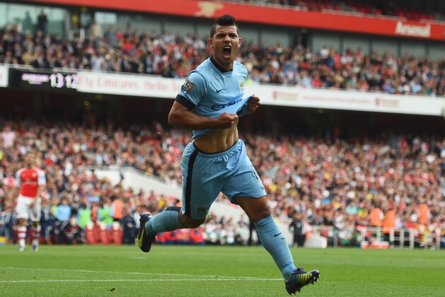 LONDON, ENGLAND - SEPTEMBER 13:  Sergio Aguero of Manchester City celebrates after scoring the first goal during the Barclays Premier League match between Arsenal and Manchester City at Emirates Stadium on September 13, 2014 in London, England.  (Photo by Shaun Botterill/Getty Images)