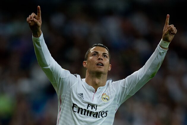 MADRID, SPAIN - SEPTEMBER 23:  Cristiano Ronaldo of Real Madrid CF celebrates scoring their fourth goal from a penalty shot during the La Liga match between Real Madrid CF and Elche CF at Estadio Santiago Bernabeu on September 23, 2014 in Madrid, Spain.  (Photo by Gonzalo Arroyo Moreno/Getty Images)