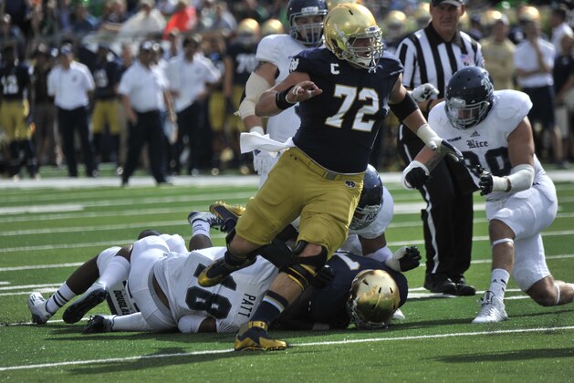 Notre Dame offensive lineman Nick Martin throws a block during a NCAA football game with Rice Saturday, Aug. 30, 2014  in South Bend, Ind.  (AP Photo/Joe Raymond)