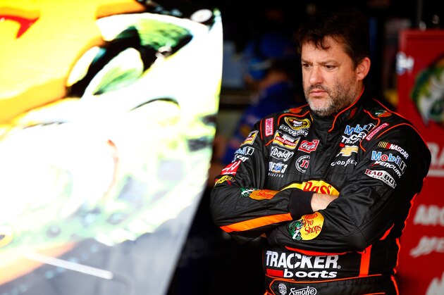 RICHMOND, VA - SEPTEMBER 05:  Tony Stewart, driver of the #14 Bass Pro Shops/Mobil 1 Chevrolet, looks on in the garage area during practice for the NASCAR Sprint Cup Series Federated Auto Parts 400 at Richmond International Raceway on September 5, 2014 in Richmond, Virginia.  (Photo by Jared Wickerham/Getty Images)