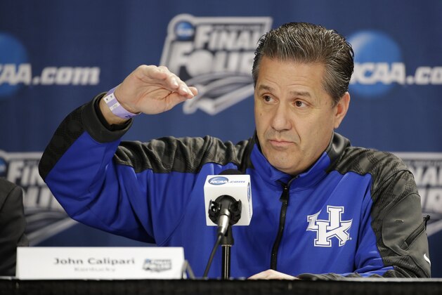 Kentucky head coach John Calipari answers a question during a news conference for the NCAA Final Four tournament college basketball championship game Sunday, April 6, 2014, in Arlington, Texas. Kentucky plays Connecticut in the championship game on Monday, April 7. 2014. (AP Photo/Tony Gutierrez)