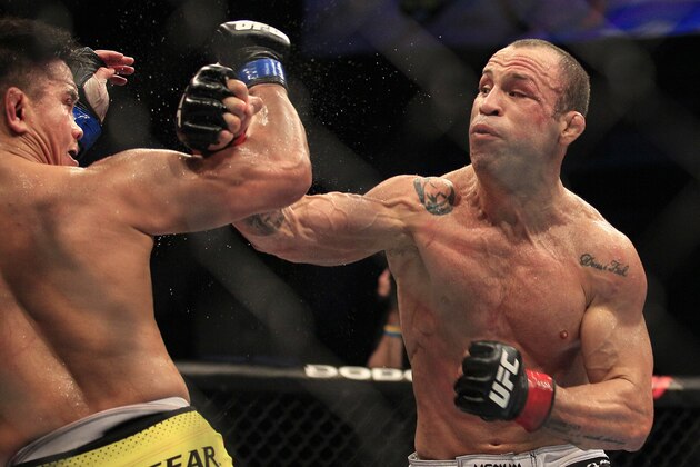 Wanderlei Silva, right, punches Cung Le during the second round of a UFC 139 Mixed Martial Arts middleweight bout in San Jose, Calif., Saturday, Nov. 19, 2011. Silva won by TKO in the second round. (AP Photo/Jeff Chiu)