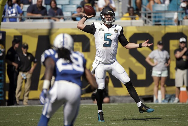 Jacksonville Jaguars quarterback Blake Bortles (5) pass against the Indianapolis Colts during the second half of an NFL football game in Jacksonville, Fla., Sunday, Sept. 21, 2014. The Colts beat the Jaguars 44-17.  (AP Photo/Stephen B. Morton)