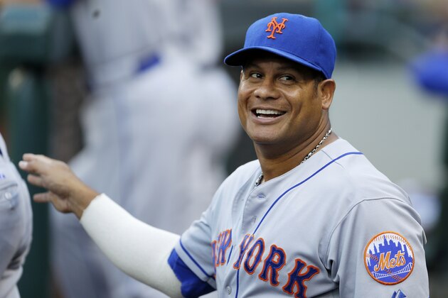 New York Mets' Bobby Abreu smiles in the dugout before a baseball game against the Seattle Mariners, Tuesday, July 22, 2014 in Seattle. (AP Photo)