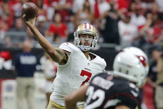 San Francisco 49ers quarterback Colin Kaepernick (7) during the first half of an NFL football game against the Arizona Cardinals, Sunday, Sept. 21, 2014, in Glendale, Ariz. (AP Photo/Rick Scuteri)