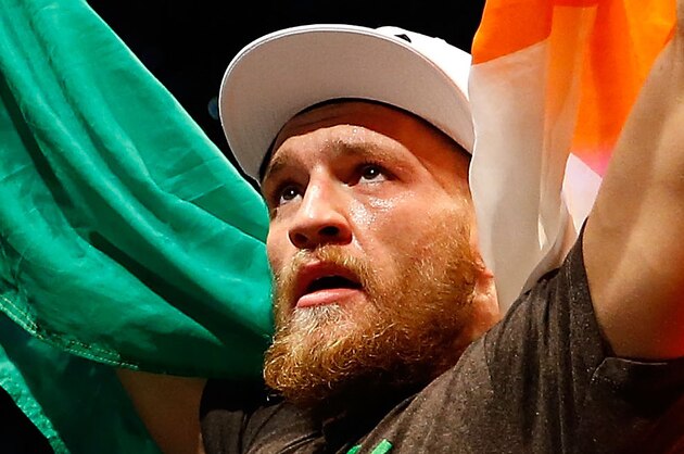 BOSTON, MA - AUGUST 17: Conor McGregor celebrates following his win against Max Holloway in their featherweight bout at TD Garden on August 17, 2013 in Boston, Massachusetts. (Photo by Jared Wickerham/Getty Images)