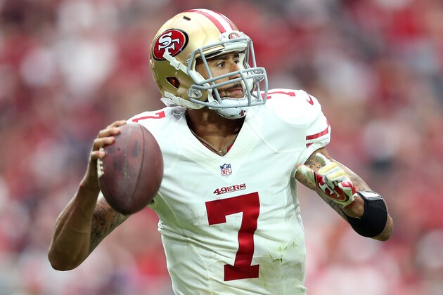 GLENDALE, AZ - SEPTEMBER 21: Quarterback Colin Kaepernick #7 of the San Francisco 49ers throws a pass during the second quarter of the NFL game against the Arizona Cardinals at the University of Phoenix Stadium on September 21, 2014 in Glendale, Arizona.  (Photo by Christian Petersen/Getty Images)