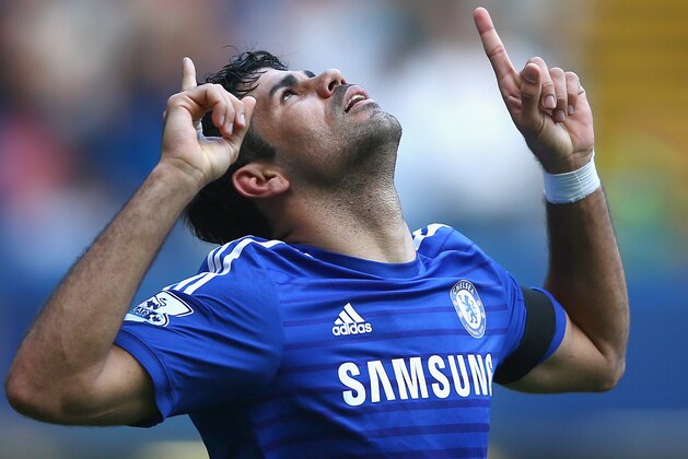 LONDON, ENGLAND - SEPTEMBER 13:  Diego Costa of Chelsea celebrates after scoring his and his team's second goal during the Barclays Premier League match between Chelsea and Swansea City at Stamford Bridge on September 13, 2014 in London, England.  (Photo by Paul Gilham/Getty Images)