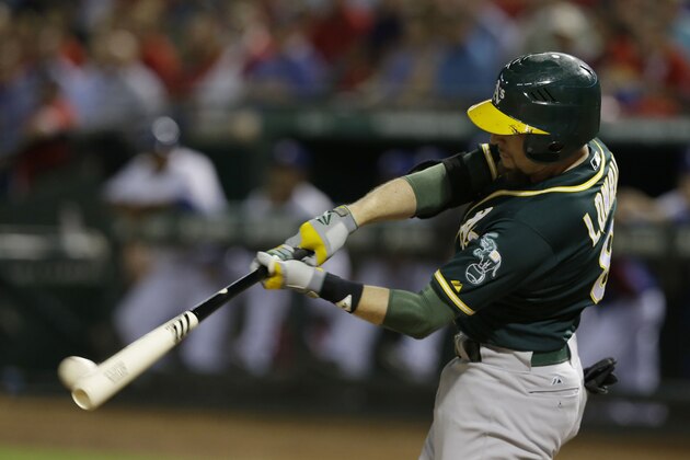 Oakland Athletics Jed Lowrie (8) singles  during a baseball game against the Texas Rangers in Arlington, Texas, Thursday, Sept. 25, 2014. (AP Photo/LM Otero)
