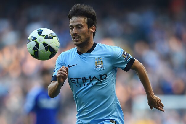 MANCHESTER, ENGLAND - SEPTEMBER 21:  David Silva of Manchester City in action during the Barclays Premier League match between Manchester City and Chelsea at Etihad Stadium on September 21, 2014 in Manchester, England.  (Photo by Laurence Griffiths/Getty Images)