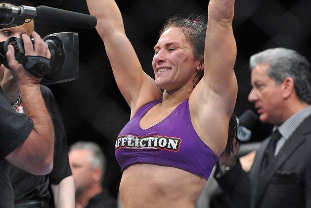 April 13, 2013; Las Vegas, NV, USA; Cat Zingano reacts to defeating Miesha Tate during the TUF 17 Finale at the Mandalay Bay Events Center. Mandatory Credit: Gary A. Vasquez-USA TODAY Sports