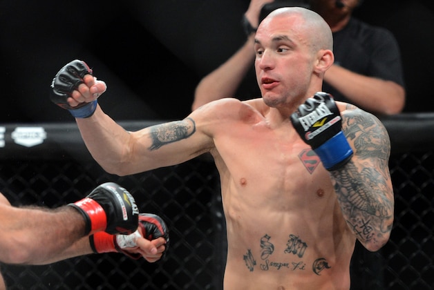 Nov 2, 2013; Long Beach, CA, USA;   Mike Richman (blue gloves) during his Bellator Flight Master Welterweight fight against Akop Stepanyan (not pictured) at the Long Beach Arena. Richman won the fight. Mandatory Credit: Jayne Kamin-Oncea-USA TODAY Sports