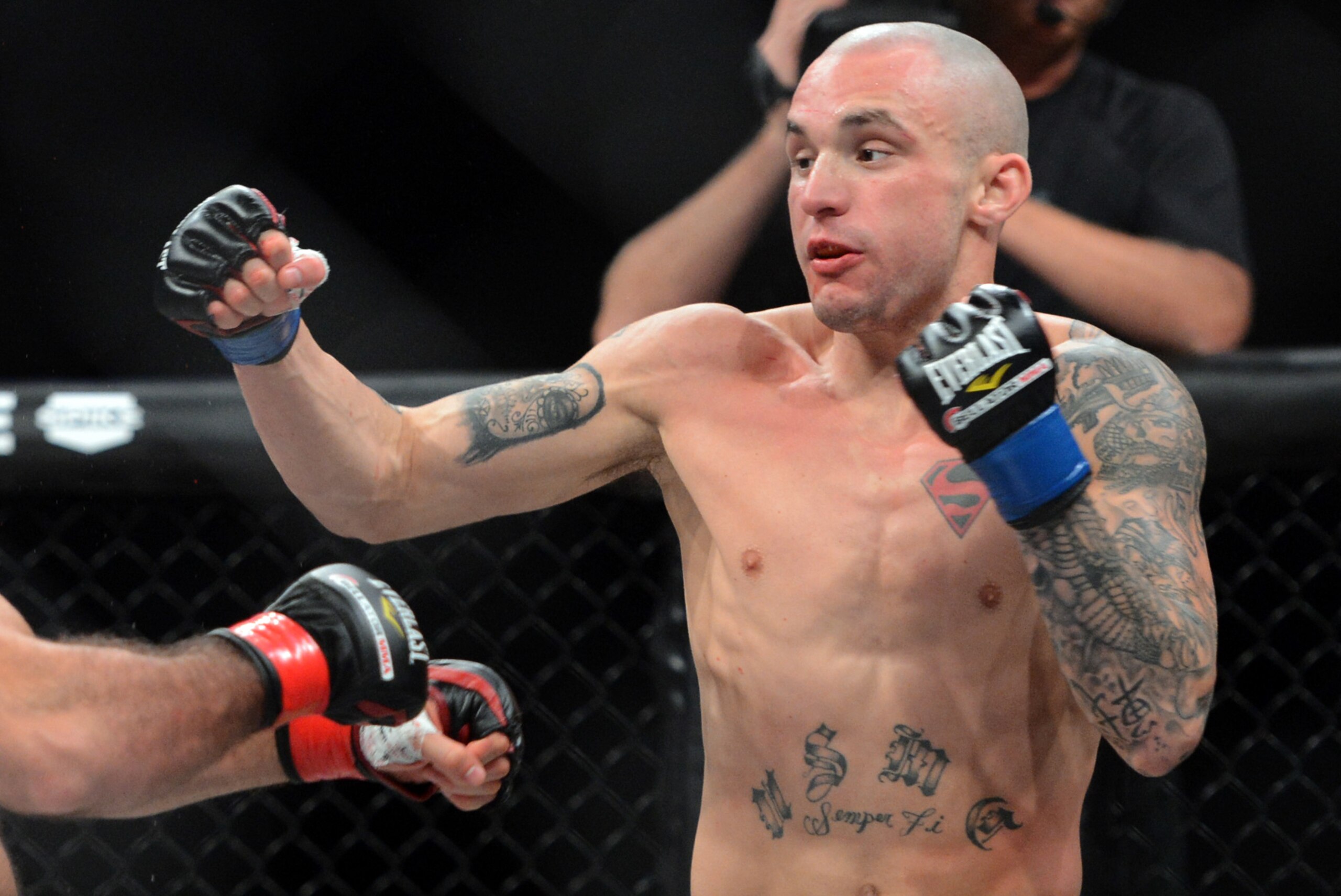 Nov 2, 2013; Long Beach, CA, USA;   Mike Richman (blue gloves) during his Bellator Flight Master Welterweight fight against Akop Stepanyan (not pictured) at the Long Beach Arena. Richman won the fight. Mandatory Credit: Jayne Kamin-Oncea-USA TODAY Sports